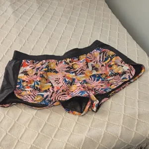 Black and Pink Athletic Shorts with Stretchy Comfort