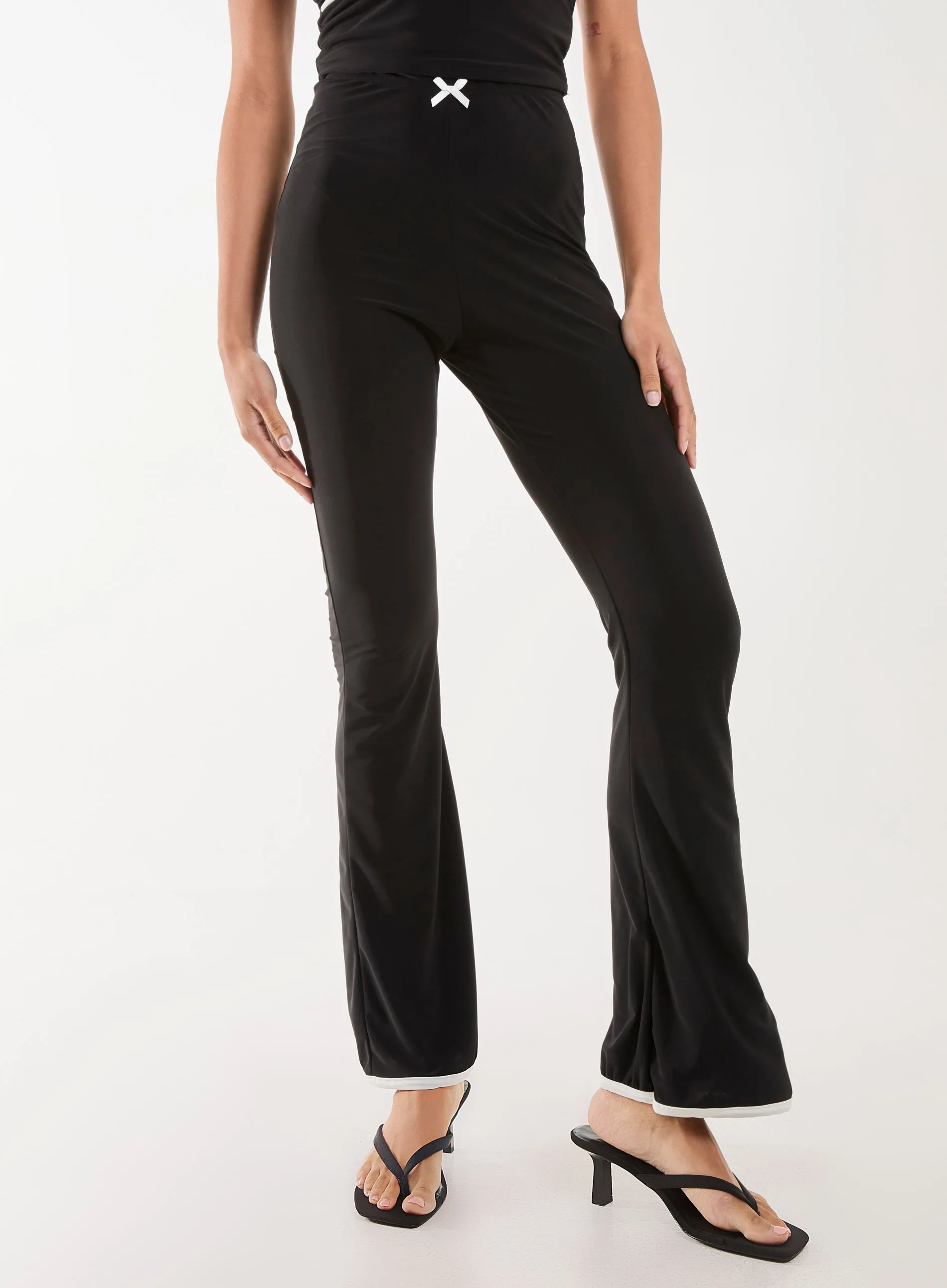 High Waisted Bow Detail Piping Flares